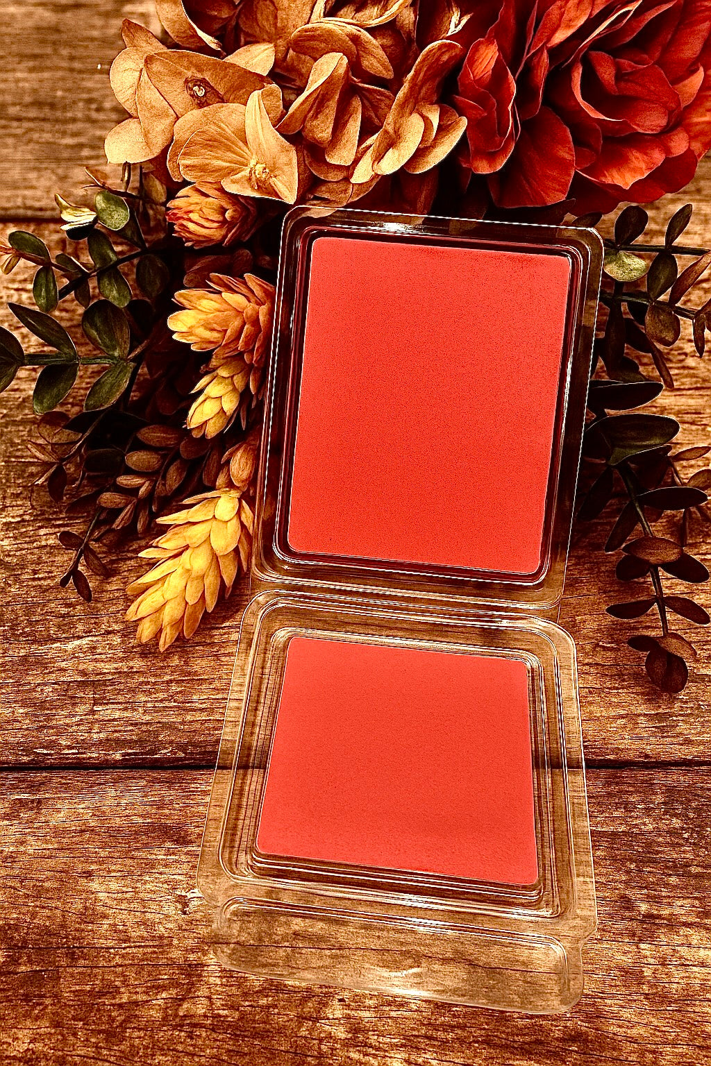 Red wax melts showing the smooth texture of the blend of soy/beeswax.