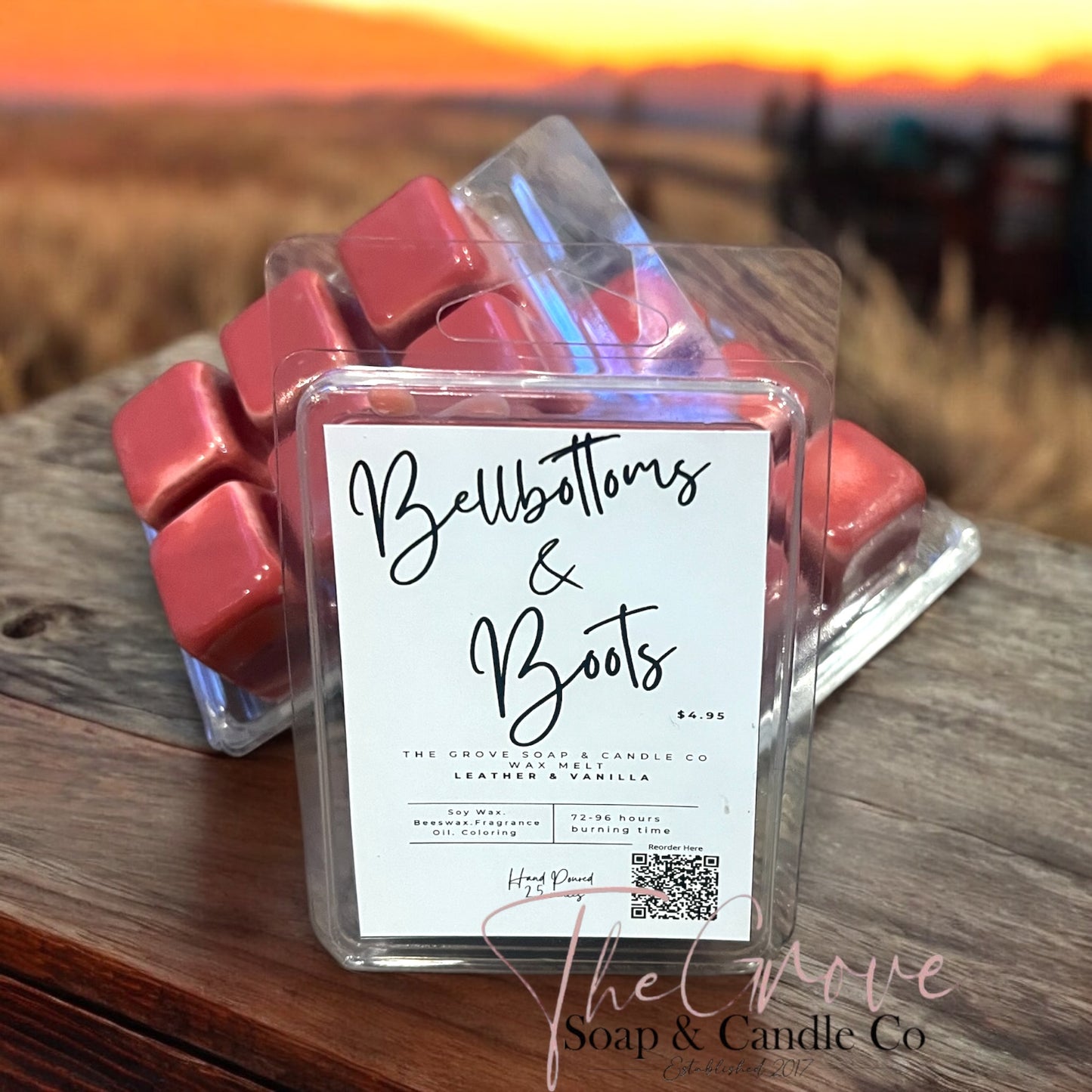 Close-up of break-apart wax melt cubes in clamshell package with label visible. Rustic background depicts the leather and warm vanilla aroma.