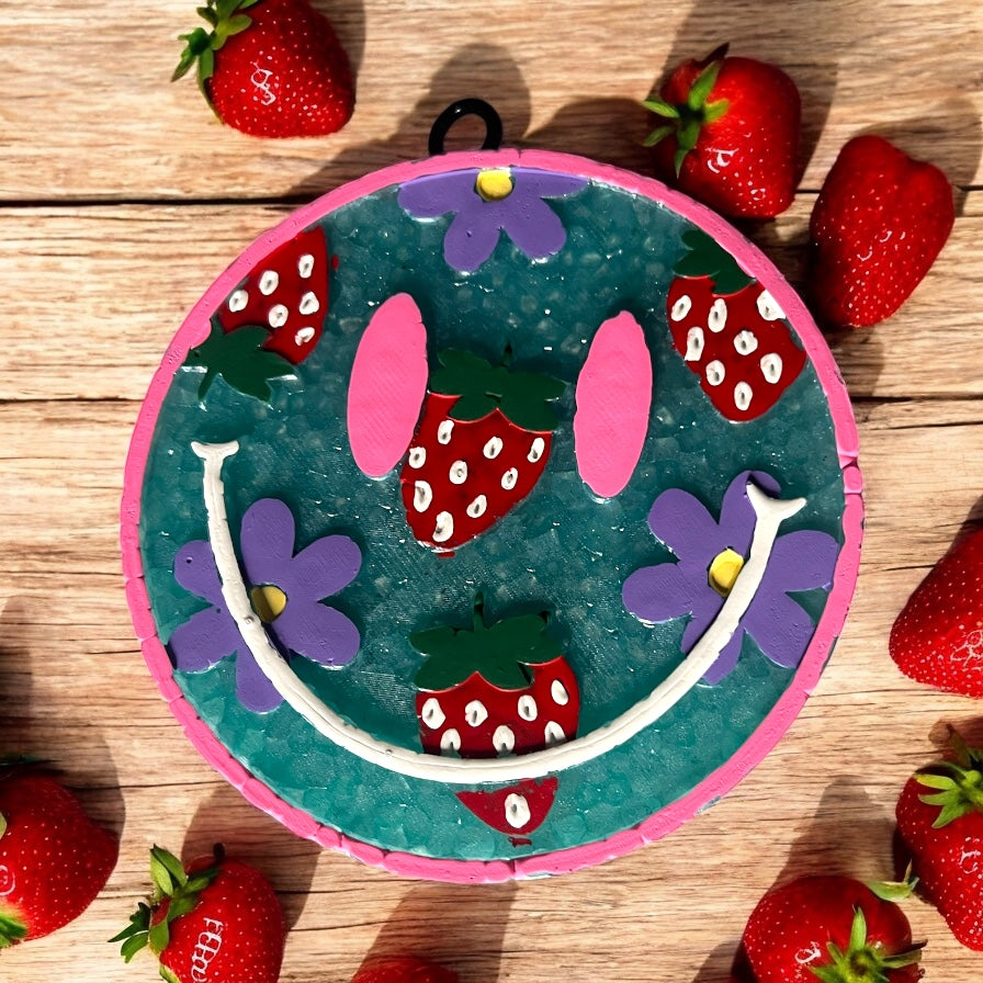 Cheerful Face Car Freshie with purple flowers