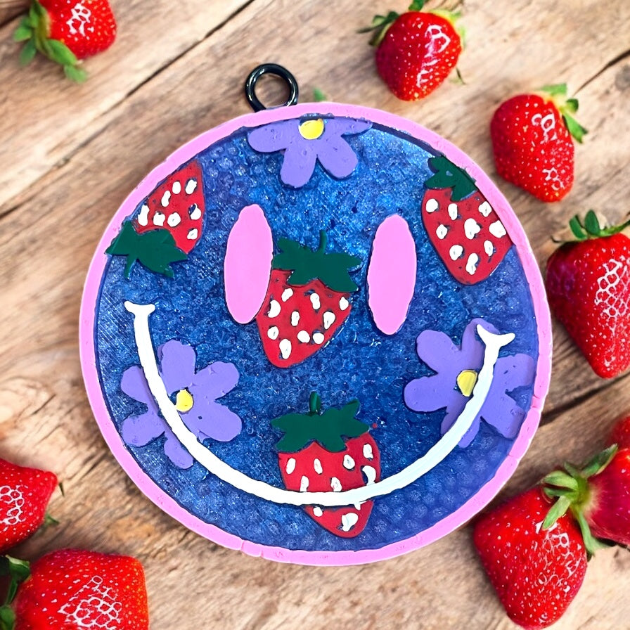 Brighten your ride with this blue and pink car freshie