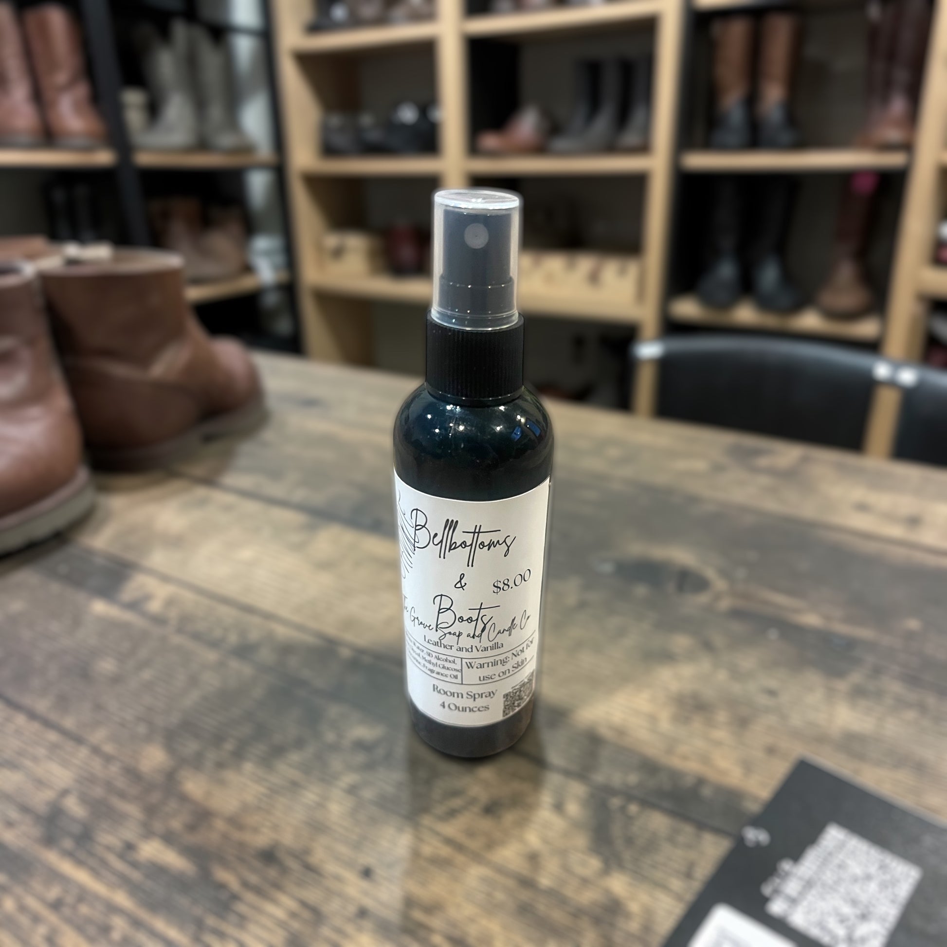 Bottle of Bellbottoms & Boots room spray. A custom blend of leather and vanilla