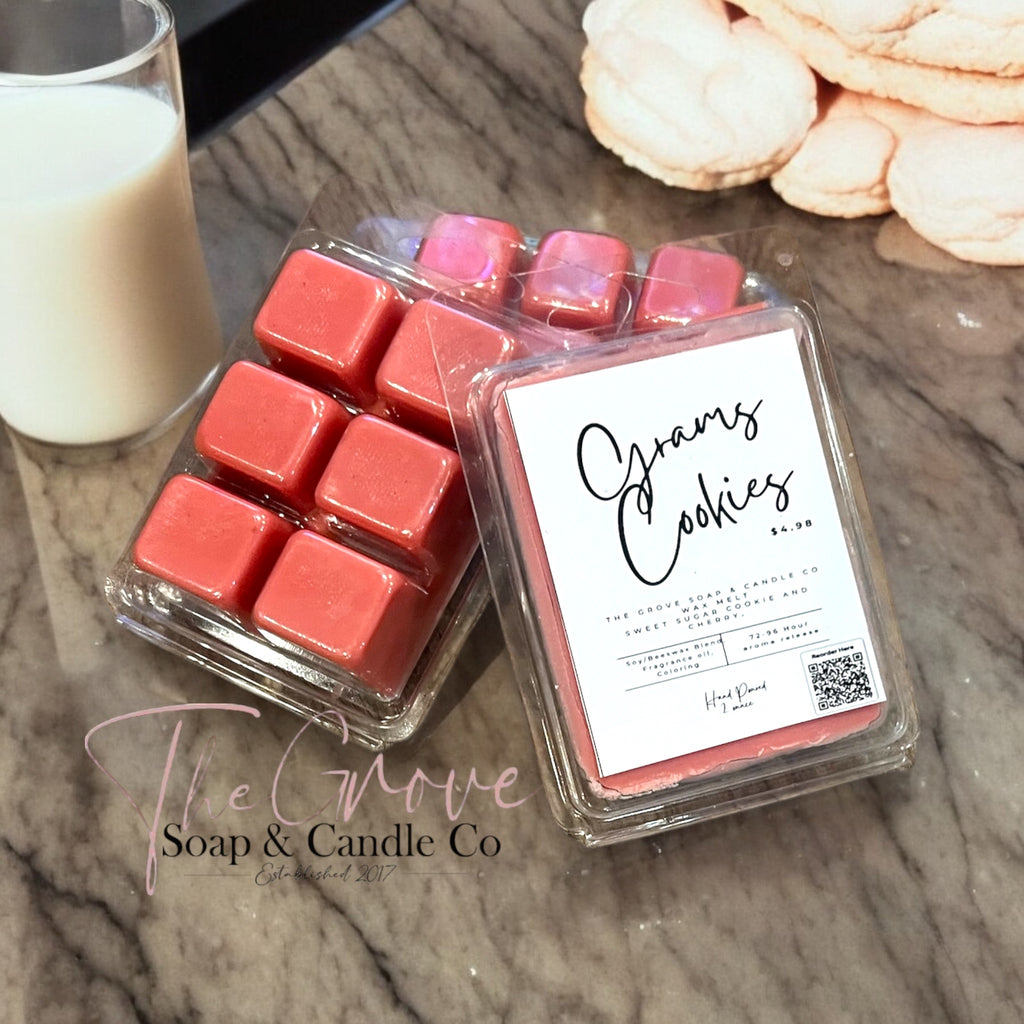 A photo of our Grams Cookies Wax Melts on a table with sugar cookies and milk 