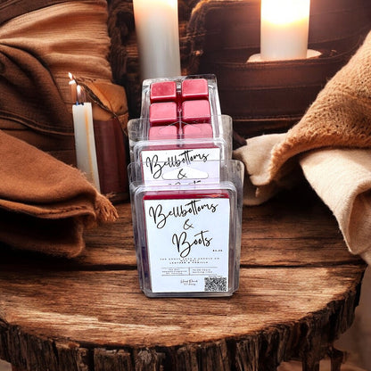 Bellbottoms and Boots wax melts styled with leather and cozy candles for rustic western vibe