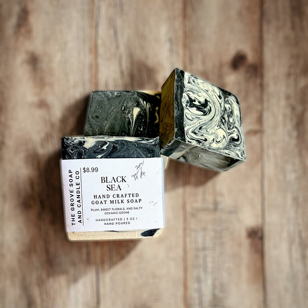 Cold processed soap with plum and ocean scent. Packaged and branded by The Grove Soap and Candle Co