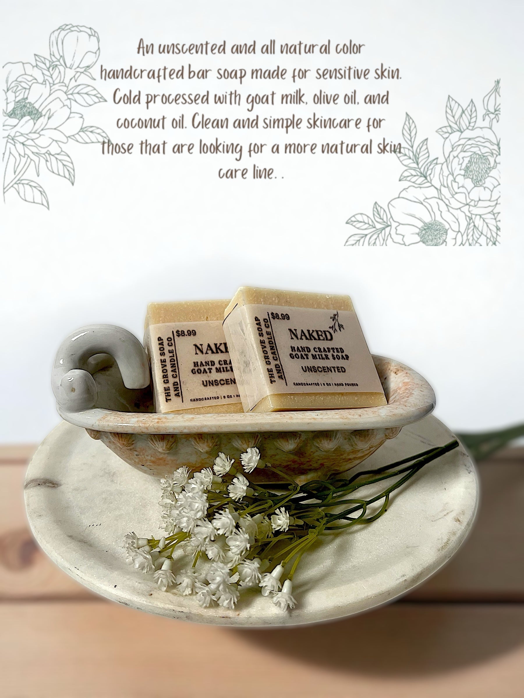 Two bars of Naked Soap in a decorative tub with flowers on a light background with a description of the handcrafted nature of this bar. 